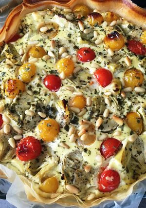Une photo de Tarte corolle aux Tomates cerise et cœurs d’Artichauts