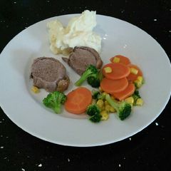 A picture of Rolled Lamb Noisette With Mash.