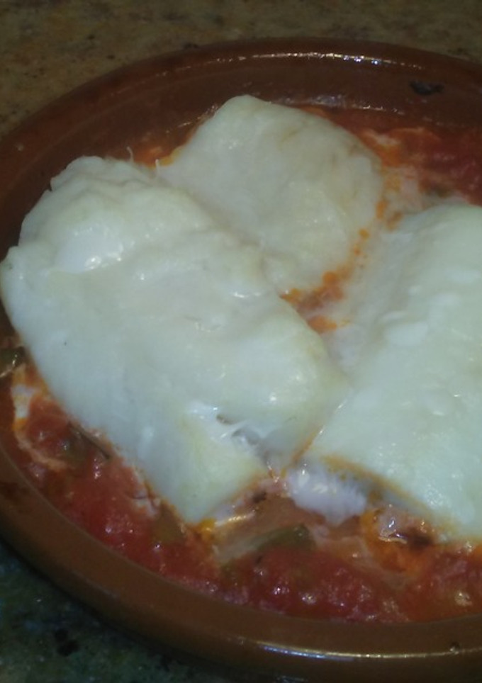 Una foto de Bacalao con tomate