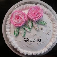A picture of Simple homemade and decorated eggless vanilla cake.