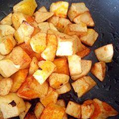 A picture of Shallow fried egg yellow color potatoes.