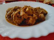 Una foto de magro de cerdo con ajos