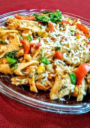 A picture of Vegetable pasta in red sauce.