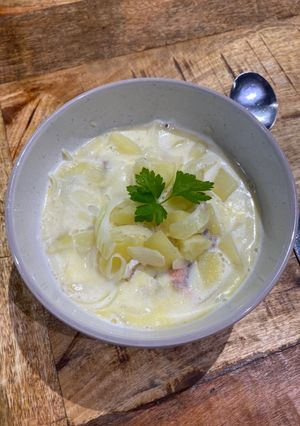 A picture of Milk soup with salmon and cod.