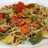Noodles al curry con verduras salteadas