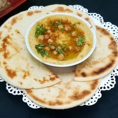 Hummus with pita bread A picture of Hummus with pita bread.