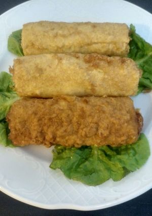 Una foto de Rollitos de pasta con jamón york y queso y curry