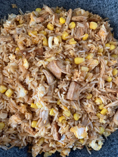 A picture of Fried Rice with Chicken and Eggs.