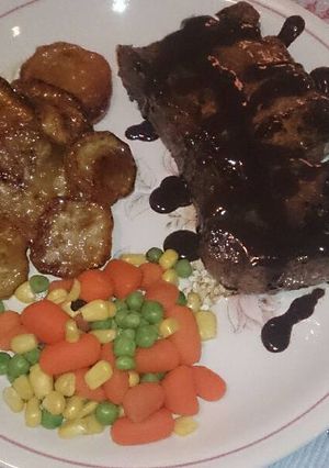 A picture of Chilli chocolate steak with caramelised sweet potato and veg.