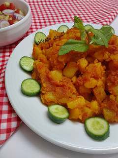 عکسی از دستور خوراک سیب زمینی گوجه