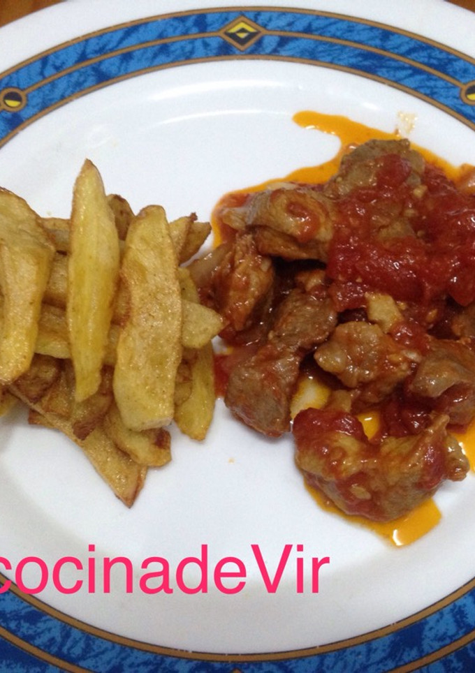 Una foto de Carne con tomate