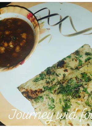 A picture of Amritsari stuffed kulcha choley.