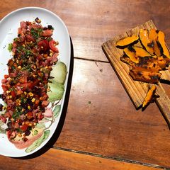 A picture of Fresh trout tartare with grilled squash.