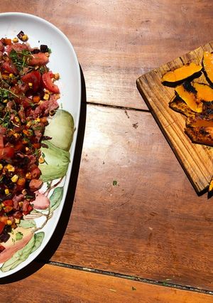 A picture of Fresh trout tartare with grilled squash.