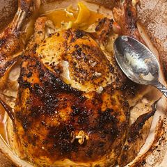 A picture of Oven roasted whole chicken.