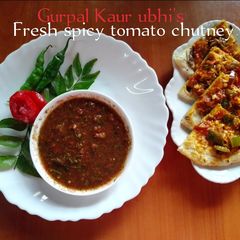 A picture of Fresh spicy tomato chutney 🍅🌿🌶️🧄.