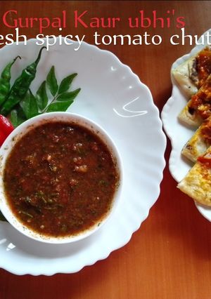 A picture of Fresh spicy tomato chutney 🍅🌿🌶️🧄.