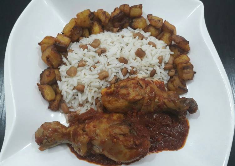 Beans,rice,fried plantain and chicken