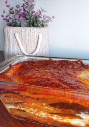 Una foto de Berenjenas napolitanas con jamón y queso gratinada🧀