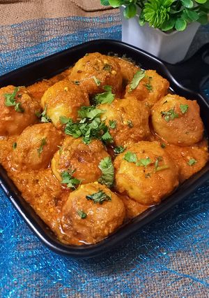A picture of Baby potatoes kashmiri dum aloo.