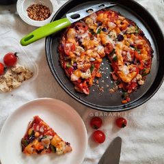 A picture of Cauliflower thin crusted Pizza.