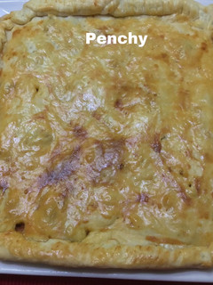 Una foto de Empanada de masa brisa con ternera y pollo