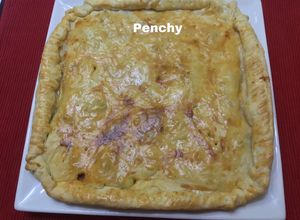 Una foto de Empanada de masa brisa con ternera y pollo