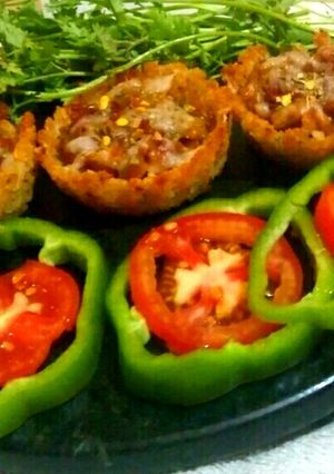 A picture of Rice cup pizza.