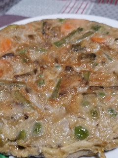 Una foto de 34. Tortilla de alcachofas y menestra