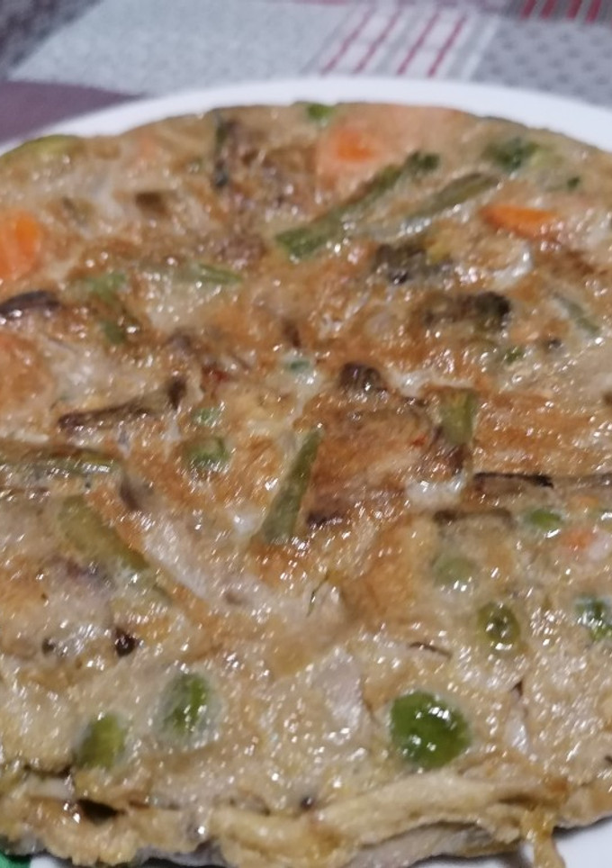 Una foto de 34. Tortilla de alcachofas y menestra