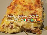 Una foto di lasagna besciamella pancetta