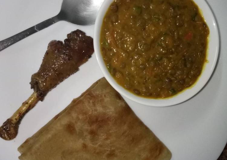 Lentils sauce, banana chapati and sweet and sour glazed chicken