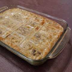 Una foto de Tarta de cebolla, champiñones y queso