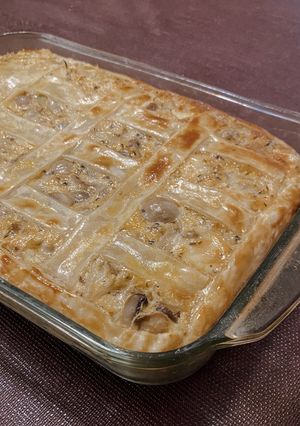 Una foto de Tarta de cebolla, champiñones y queso