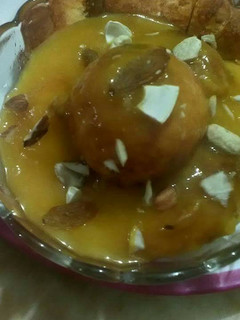 A picture of Mango Dip with Paneer Balls.