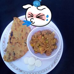 A picture of Sahjane ke full ki sbji or masala mki ki Roti.