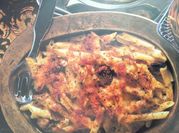 Una foto de pasta penne con atun