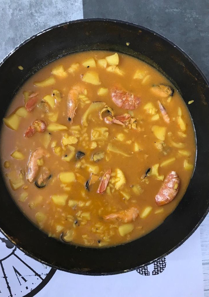 Una foto de Arroz meloso de pescado