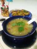Chicken soup with garlic bread