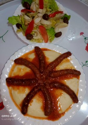 صورة لوصفة بيري بصلصة المرڨاز 🌭😋