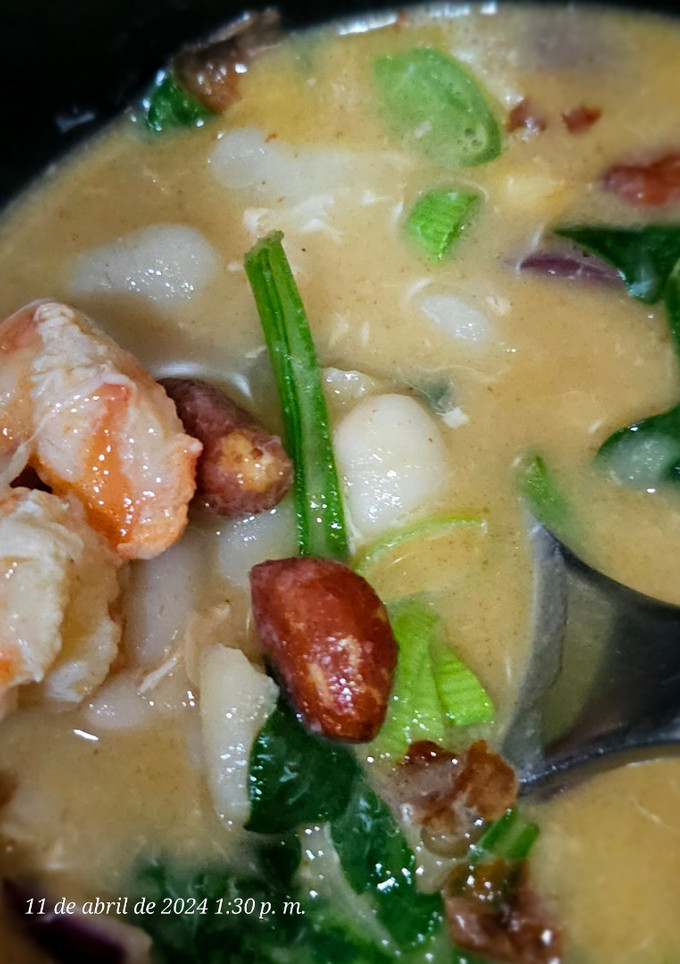 Una foto de Judías blancas, langostinos en curry verde