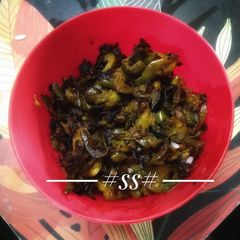 A picture of Neem leaves with Eggplant fry.