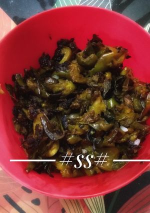 A picture of Neem leaves with Eggplant fry.
