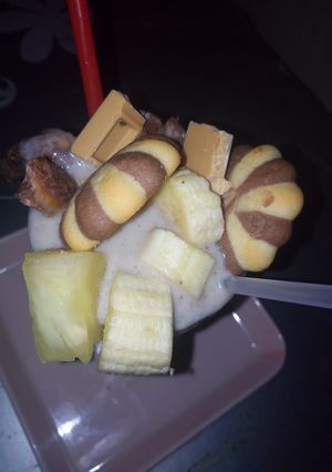 A picture of Chocolate, banana and pineapple smoothie.