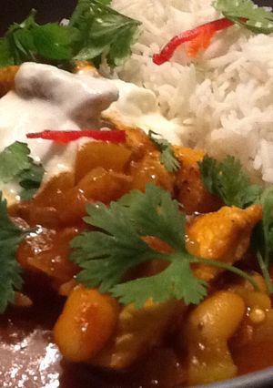 A picture of Yellow chicken curry.