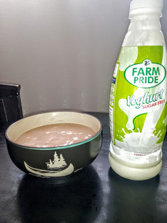 A picture of Guinea corn pap and yoghurt/milk.