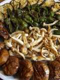 Parrillada de setas variadas, pimientos de Padrón y berenjena