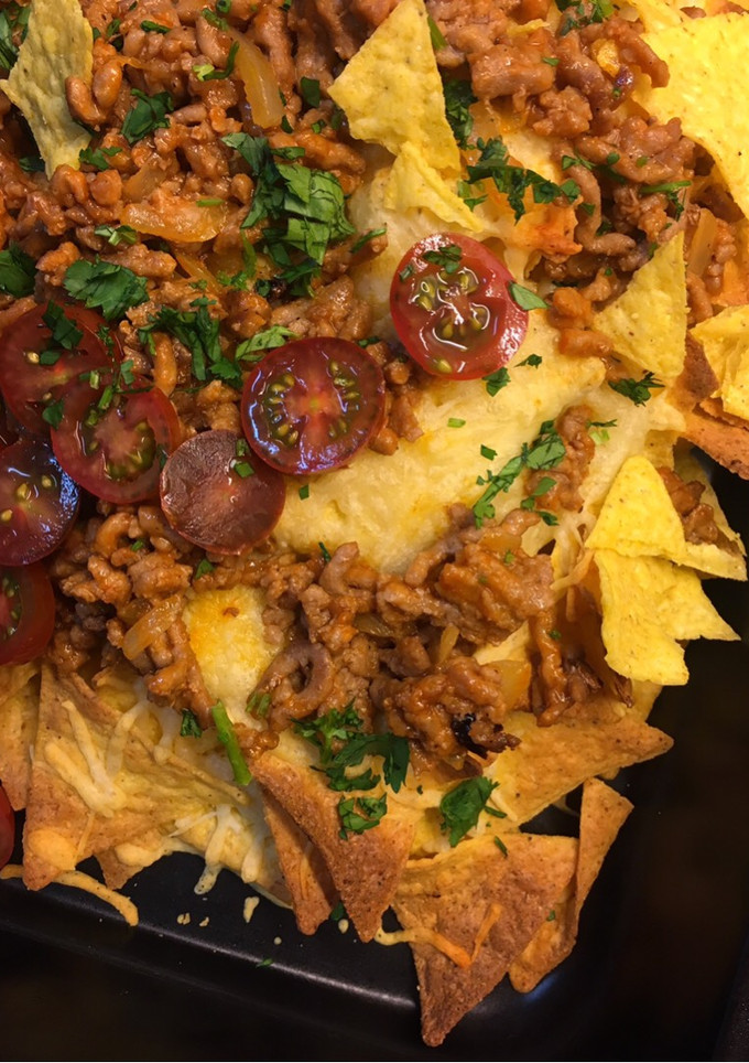 Una foto de Nachos con queso y carne 🇮🇹 y viva México!