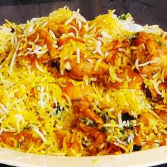 A picture of Layered chicken biryani step by step preparation.