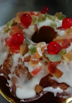 Una foto de Budín de Naranja 🍊 con frutas y glasé de Naranja 🍊